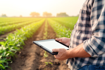 Close up farmer checking agriculture quality by using tablet and technology to control. Smart farm. Agro business. - obrazy, fototapety, plakaty