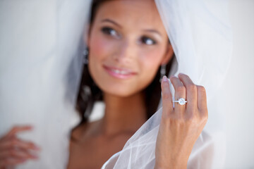 Diamond, wedding ring and hand of bride with jewellery and pride for commitment, celebration or...