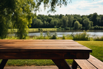 Naklejka premium Wooden table for picnic with river view