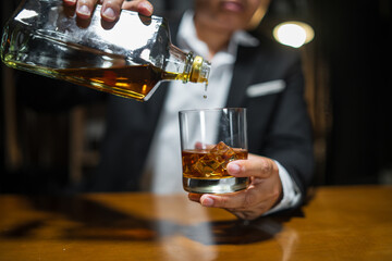 Businessmen in suits drinking  Celebrate whiskey