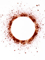 Top angle shot of coffee powder circle on white background.