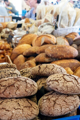 Assortment of bakery products. Different types of bread on display at a farm food fair