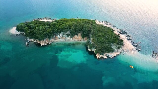 Flight Over the Albanian Riviera with Turquoise Water and a Small Island