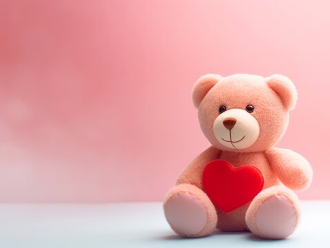 Cute Teddy bear with red heart on pastel color background with copy space, Valentine's day concept
