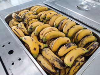 a bunch of bananas in a container