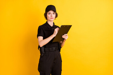 Photo of confident person arms hold pen clipboard take note look attentively camera isolated on...