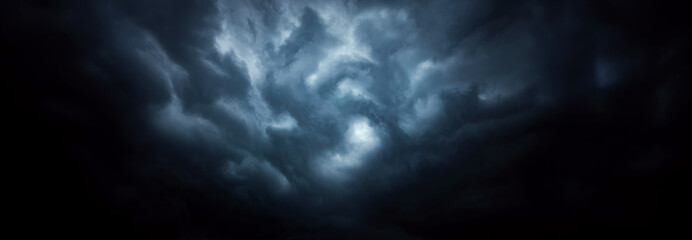 Dramatic sky with storm clouds before rain. Panoramic view of the stormy sky and dark clouds. ...