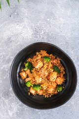 Stir-fried fried fish with broccoli and chili in thai style