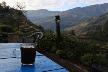 a glasses of nepali black tea in poonhill trekking circle