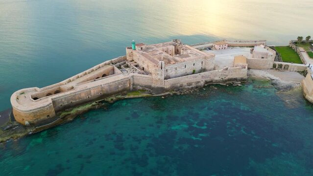 Syracuse, Sicily, Ortigia island, Etna volcano, UNESCO Italy. Europe heritage, Ortygia Historical centre, Piazza Duomo, Cityscape drone Aerial view of Castello Maniace citadel from above