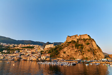 Scilla. The fishermen village of Chianalea Calabria Italy at sunrise and the Ruffo castle high on...