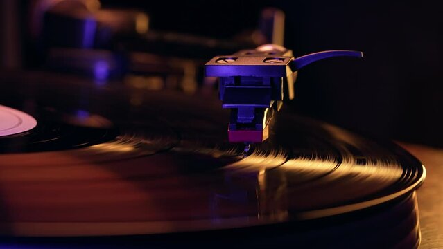Hypnotic spin of vinyl disc. Timeless cinematic charm of analog music.Audiophile