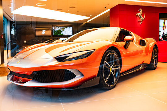 New York City, USA - August 09, 2023: Ferrari 296 GTS 2022 tuned sport car in showroom, corner view