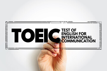 TOEIC - Test Of English For International Communication acronym stamp, concept background