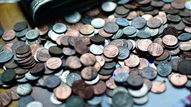 Selective focus bokeh Us money cash and coins, counting, savings, inflation theme