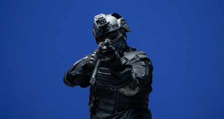 Soldier in black uniforms with weapon gun in studio. Banner Military army concept