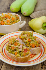Sandwiches with fresh vegetable stew on the kitchen table