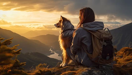 Fototapeten Młoda podróżniczka z plecakiem i psem na górskim szlaku.  © Bear Boy 