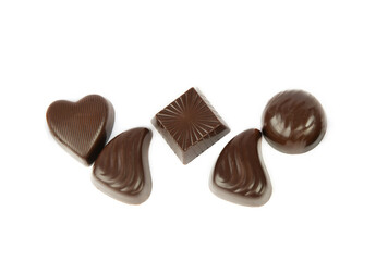 Various chocolate candies isolated on white.