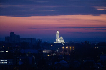 Fototapeta na wymiar Sunset in Kaunas, Resurrection Church and City Panorama in the Evening