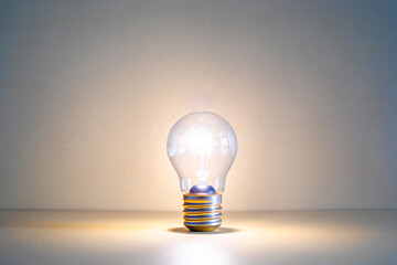 Lighting light bulb. Concept of business start-up due to successful creative idea