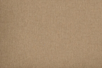 Texture of luxurious brown fabric for cutting and sewing clothes. Background made of dense...