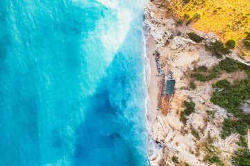 Albania riviera. Beach on coast of Ionian Sea in Albania, Ksamil, near Greece island Korfu. Shpella e Pëllumbave beach - obrazy, fototapety, plakaty