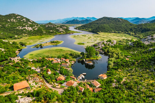 Canyon of Rijeka Crnojevica river near the Skadar lake coast. One of the most famous views of Montenegro. River makes a turn between the mountains. Karuc willage