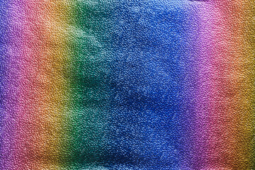 Rainbow gradient textural Background. Textured metallic paper or foil