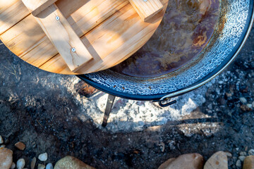 cooking traditional goulash boiling in a 12 liter cauldron outdoors - obrazy, fototapety, plakaty