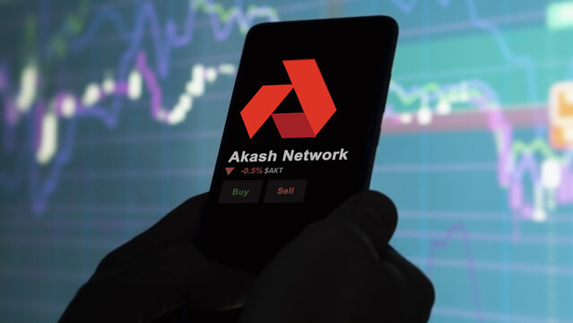 Akash Network on a phone, the token coin $AKT on a crypto exchange screen, an investor analyzing the price.