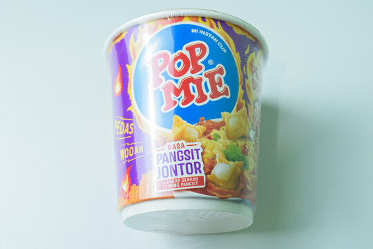 Instant noodle cup pop mie isolated on white background. Bekasi, Indonesia, December 14, 2023