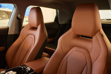 Car inside. Interior of prestige modern car. Comfortable leather seats