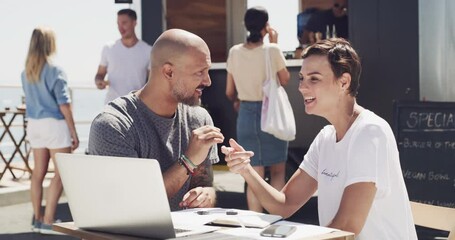People, high five and laptop for food truck, small business or startup success, winning and profit, sales or goals at beach. Entrepreneur, man and woman hands together for online teamwork at cafe van