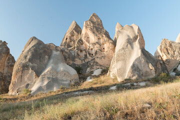 eroded volcanic rock formations with pigeon houses, Cappadocia, Turkey