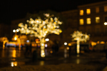Bokeh night light joyful abstract blur of Christmas festive time background. Blurred christmas...