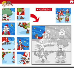 Obraz na płótnie Canvas jigsaw puzzle game with Santa Clauses on Christmas