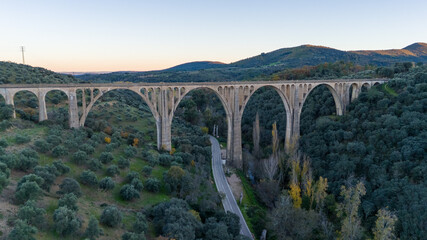 Fototapeta na wymiar The Viaducto de Guadalupe a bridge built to connect Madrid to Extremadura and Andalucía by train