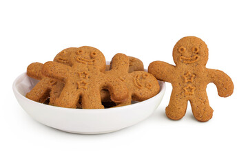 Gingerbread man in ceramic bowl isolated on white background