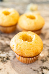 Filling Vanilla, Chocolate Cupcakes with Lemon, Raspberry