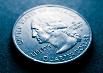 A quarter dollar coin. Liberty