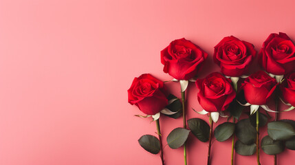Serene top view of red roses carefully arranged on a pastel red backdrop, providing a delightful and visually appealing image with copyspace, 