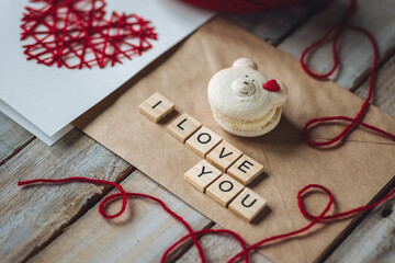 Message I love you spelled in wooden blocks. Concept of romantic note, handmade gift for Saint...