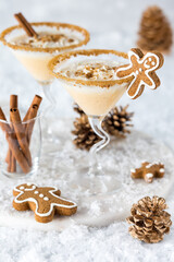 Obraz na płótnie Canvas Gingerbread martinis topped with whip cream and cookie crumbs.