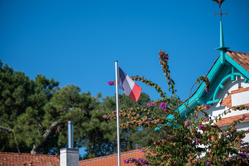 Beach houses in Arcachon Bay with many fisherman's boats and oysters farms, Cap Ferret peninsula,...