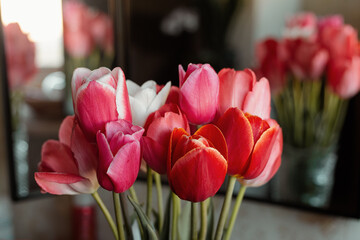 Mix of spring tulips. Tulips bouquet. Holiday decor with flowers. Bouquet with colorful tulips. Spring tulips, bouquet.