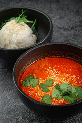 Thai tom yum soup with rice