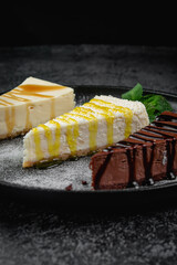 Cheesecakes in assortment, cream, chocolate