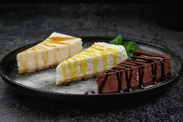 Cheesecakes in assortment, cream, chocolate