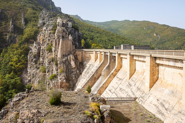 the dam of the Luna reservoir and ruins of the castle, Los Barrios de Luna, province of Leon, Castile and Leon, Spain